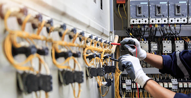 Professional Electrician technician working in Long Beach, IN